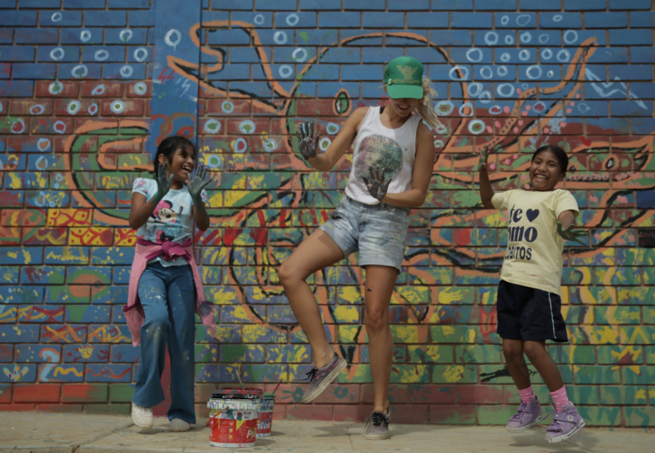 Emi Koch Playing with Children